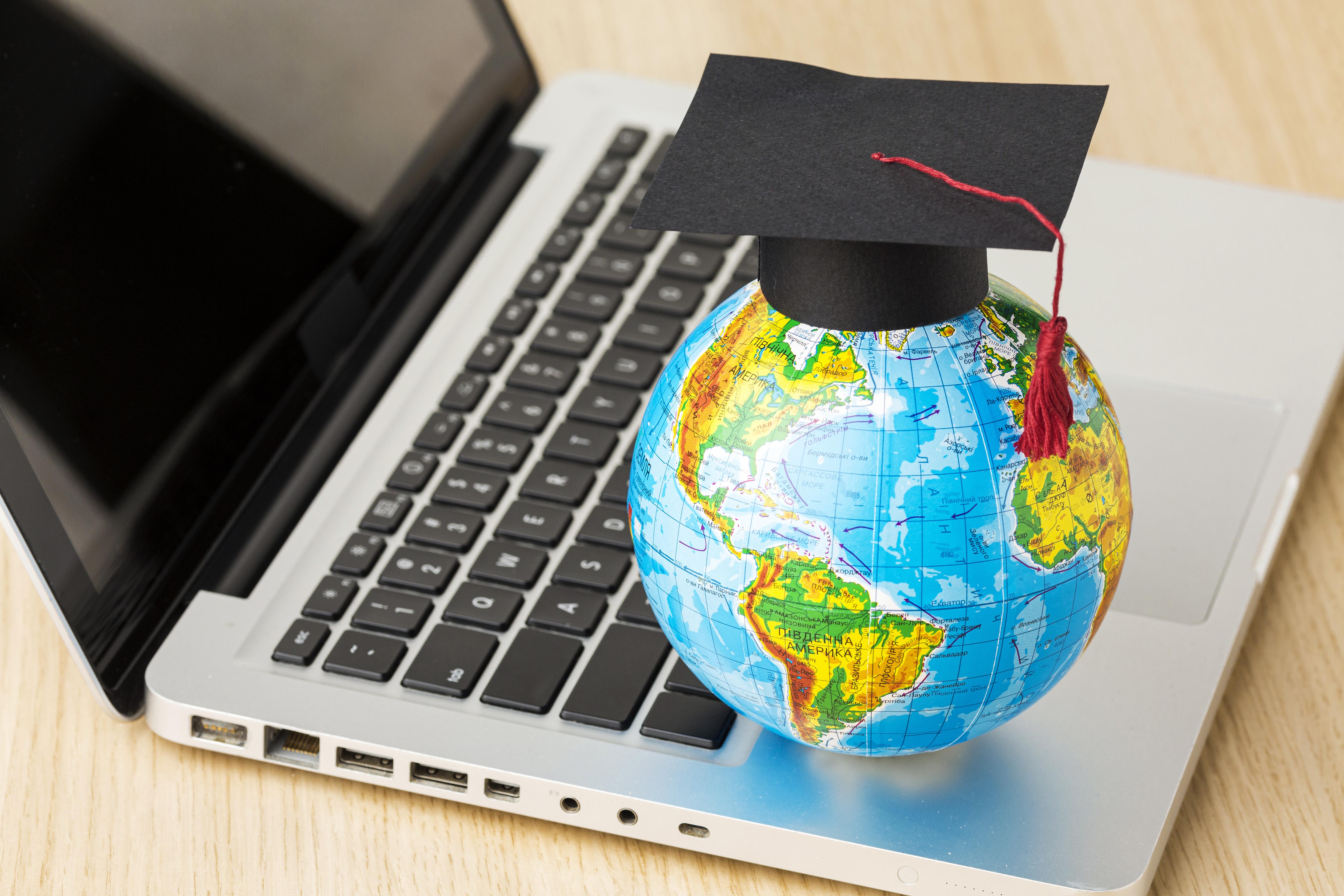 http://thesfedu.in//media/2025/02/high-angle-globe-with-academic-cap-laptop.jpg